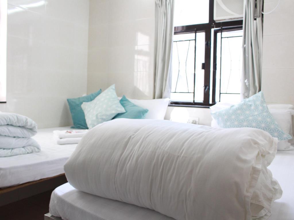 הונג קונג New Yan Yan Guest House Reception 9Th Floor Flat E4 E6 מראה חיצוני תמונה