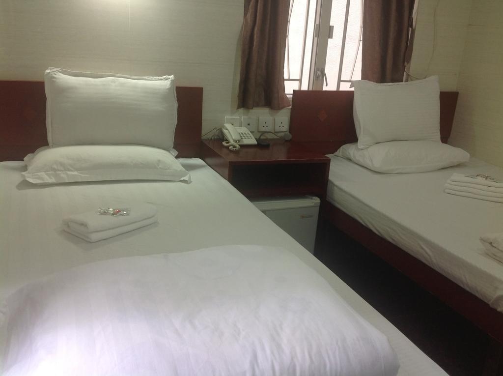 הונג קונג New Yan Yan Guest House Reception 9Th Floor Flat E4 E6 מראה חיצוני תמונה